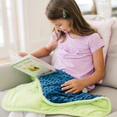 Encourage increased concentration and performance at school, work or home with this weighted lap pad. Featuring bright colors and both smooth and textured surfaces, thisproduct offers sensory satisfaction as the gentle pressure helps users relax and focus on the task at hand.o Plush, high-quality fabric with textured and smooth surfaces for added sensory inputo Weighted at 5 lbs., the ideal weight for children ages 5 and upo Sized at 24"x19.5" for use at home or on the goo Hand wash in cold waterAge Recommendation: Ages 5 and up Kids Writing Activities, Weighted Lap Pad, Sensory Input, Gifted Education, Ideal Weight, Quote Cards, Stem Toys, The Little Prince, Emotional Development