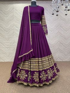 Bollywood Replica LehengaFaux georgette lehenga and choli with 5mm sequence embroidery work.Semi stitch lehenga and unstitch blouse material .Dupatta in faux georgette with ruffles work with four side lace border.Shipping time 5-7 daysBuy this Saree at Kollybollyethnics and make your occasion very special !!. With Express Free Shipping and Custom Stitching, Shop Bollywood Model Purple georgette wedding lehenga at kollybollyethnics from India with free worldwide shipping. Sequins Lehenga Choli, Sequins Lehenga, Purple Lehenga, Chic Prom Dresses, Georgette Lehenga, Indian Lehenga Choli, Lehnga Dress, Bollywood Lehenga, Lehenga Choli Online