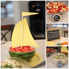 there is a boat made out of watermelon and strawberries on the table