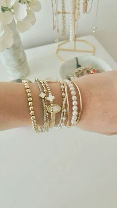 White And Gold Bracelet Stack, Jewelry Stack Ideas, Bracelet Stack Ideas Gold, Bracket Stacks, Cute Bracelet Stacks, Enewton Stack, Enewton Bracelets Stacks, Preppy Bracelet Stack, Enewton Bracelet