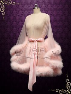 This marabou fur edged boudoir robe is incredibly sexy and playful, perfect for your honeymoon! Photoed in a peachy blush, can be made in other colors of your choice. Long： Approx 57-59 inches long Short : Approx 35 inches Long Working Time: 1-2 weeks Rush Order or customization please inquire prior to order. Custom Designs We specialize in custom design services.If there's a dress you like and it's not on our website,you're more than welcome to email us a picture of the dress for a quote. Honeymoon Robe, Fancy Robes, Peachy Blush, Character Board, Wedding Robe, Honeymoons, Soft Tulle, Dress Purchase, Wedding Night