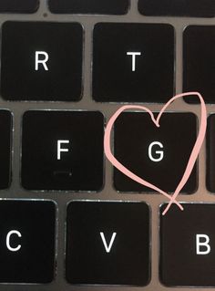 a keyboard with a heart drawn on it