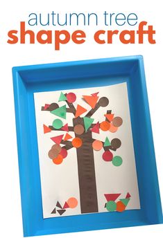 an autumn tree shape craft made out of paper and colored circles on a blue frame