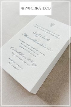 a white wedding card with the words paperattco on it