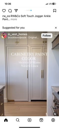 an image of a kitchen with white cabinets