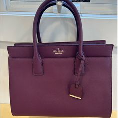 New Kate Spade Bag With Matching Wallet In Burgundy. Top Handle And Adjustable Shoulder Strap Handbag: Brand New, Missing Tag 13”Wx10”Hx6”D Color: Burgundy Hardware: Gold Tone Handles: 6” Drop Wallet: Brand New Large Wallet With Tag 8”Wx4”Hx2”D Color: Burgundy Hardware: Gold Tone Classic Purple Rectangular Bag, Classic Purple Bag With Top Carry Handle, Classic Purple Satchel For Daily Use, Classic Purple Bag With Detachable Handle, Kate Spade Burgundy Bags For Everyday Use, Kate Spade Burgundy Leather Bag, Classic Purple Satchel For Everyday Use, Classic Purple Bags For Everyday Use, Classic Purple Bag For Everyday Use