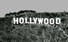 the hollywood sign is on top of a mountain