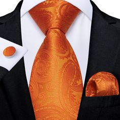 This Orange Paisley Silk Tie is a fashion-forward accessory that makes a statement. You'll turn heads with its 59.06'' length and 3.35'' width. Made with silk, it's light and comfortable to wear, and comes with a tie, hanky, and cufflinks set. Stand out in style with the DiBanGu Designer. SPECIFICATIONS Ties Type: Neck Tie Set Tie Size: One size 59.06''(150cm) length and 3.35''(8.5cm) width Tie Set: Tie Hanky Cufflinks Set Style: Fashion Size: One Size Pattern Type: Paisley Model Number: MJ-7891 Luxury Yellow Ties For Men, Pink Wedding Accessories, Blue Pink Wedding, Men Tie, Groom Accessories, Wedding Tie, Business Party, Tie For Men, Tie Gifts