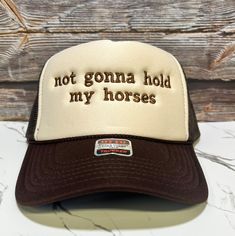 Not Gonna Hold My Horses Embroidered Trucker Hat - Etsy Brown Letter Print Hat, Brown Letter Print Hat, One Size Fits Most, Fun Adjustable Trucker Hat For Rodeo, Novelty Adjustable Flat Bill Hat, Brown Letter Print Snapback Hat, Fun Trucker Hat For Country Events One Size, Country Style Adjustable Trucker Hat For Western-themed Events, Trucker Hat For Western-themed Events, Customizable Funny Trucker Hat