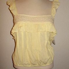 Free People Misses Size Medium Fashion Tank /Blouse Light Yellow In Color All Over Pin Dot Ruffle Cross Back Straps Crochet Front Cropped Style Elastic Hem Pull Over Style 100% Rayon Nwt Ruffle Fashion, Dot Crochet, Yellow Tees, Cropped Camisole, Maxi Tops, Active Tank Tops, Ruffles Fashion, Medium Fashion, Grey Tank Top