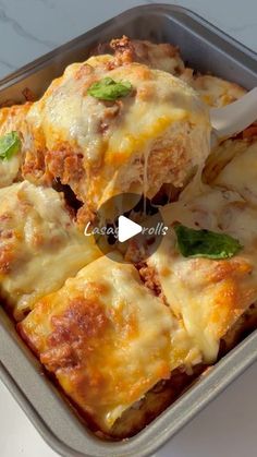 lasagna casserole with cheese and meat in a pan