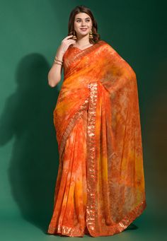 Chiffon light weight Saree in Orange colour 224  Desc:  Style : Light Weight Sarees Color : Orange Fabric : Chiffon Work : Printed   Sequence Wash Care : Dry clean Sleeve Style : Sleeveless Long Sleeves : Done only in Custom Stitch Sleeves Lining : Done only in Custom Stitch Bust Size : 32 to 42 Inches Occasion : Festival   Sangeet   Ceremonial   Temple Wear   Social Gathering   Gudi Padwa. With Express Free Shipping and Custom Stitching, Buy Indian Party wedding and bridal Sarees Chiffon light Light Weight Sarees, Royal Blue Saree, Gudi Padwa, Orange Saree, Orange Chiffon, Fancy Sarees Party Wear, Indian Party, Color Blouse, Wedding Saree Indian