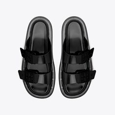 The Buckle Bubble Jelly pairs adjustable straps — adorned with Double T metal buckles — with a bubble sole, named for its soft cushioning. The waterproof sandal is pared back and versatile — a perfect addition to the summer wardrobe.