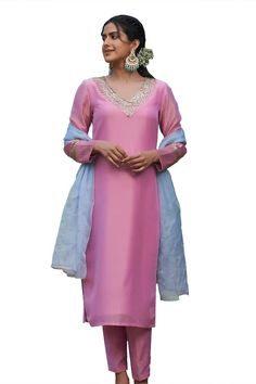 Pink kurta with sequin embroidery on neckline. Paired with straight fit pant and blue badla work dupatta. - Aza Fashions Festive Party Sets With Embroidered Neckline, Elegant Palazzo Set With Embroidered Neckline, Elegant Festive Palazzo Set With Embroidered Neckline, Party Sets With Embroidered Neckline For Eid, Festive Silk Unstitched Suit, Chanderi Straight Kurta Set With Embroidered Neckline, Chanderi Churidar With Mirror Work, Chanderi Sharara For Formal Occasions, Elegant Salwar Kameez With Embroidered Neckline