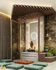 a living room filled with lots of furniture next to a wall mounted buddha statue on top of a wooden shelf