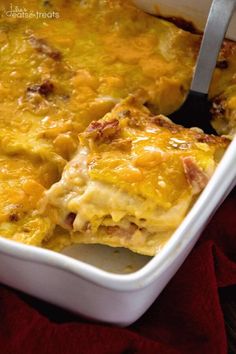 a casserole dish with meat and cheese in it