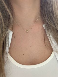 14K Gold Heart Necklace | Puff Heart Necklace | Dainty Heart Gold Necklace | Solid Gold Heart Necklace | 16"+2"This beautiful Puff Dainty Heart, can be worn as a choker, as a layering piece or part of a layering necklace set. It will add a statement to your outfit. It can be combined with multiple chains of different lengths to give the messy chains look. It comes available in this tricolor gold color only. ♦ Materials: 14K Yellow Gold♦ Available colors: Yellow Gold ♦ Necklace measurements: 16" Yellow Gold Heart Bead Necklace For Everyday, Tiny Heart Necklaces For Anniversary, Everyday Heart Cut Necklace, Everyday Yellow Gold Heart Beads Necklace, Tiny Heart Pendant Necklace, 14k Gold Tarnish-resistant Fine Heart Necklace, Gold-tone Delicate Heart Chain Necklace, Dainty 14k Gold-filled Yellow Gold Heart Necklace, 14k Gold Tarnish-resistant Heart Necklace Gift