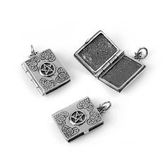 Crafted from sterling silver, these lockets feature a grimoire design for a delightfully witchy aesthetic! Silver Charms Jewelry For Keepsake, Engraved Pewter Jewelry Gift, Antique Silver Sterling Silver Charms For Gifts, Antique Silver Sterling Silver Keepsake Jewelry, Spiritual Antique Silver Charms Jewelry, Antique Silver Spiritual Charms Jewelry, Antique Silver Spiritual Jewelry With Charms, Spiritual Antique Silver Jewelry With Charms, Spiritual Silver Pewter Jewelry