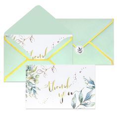 two envelopes with thank you written on the front and back, one in green