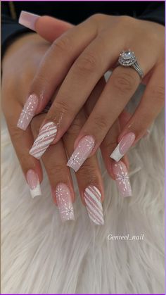 White Candy Nails inspired nails by Genteel Nail Salon. White candy cane nail design | French tip nail art | Sparkly Nails | Glitter Nails | Fall Nails White And Glitter Christmas Nails, Gold And Pink Christmas Nails, Christmas Nails Latina, Pink And White Candy Cane Nails, Pink French Tip Christmas Nails, Pink Acrylic Nails Christmas, Nails 2024 December, White Glitter Nails French Tips, Winter Sparkly Nails