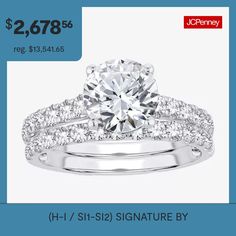 a white gold engagement ring set with diamonds