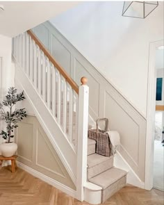 the stairs in this house are painted white