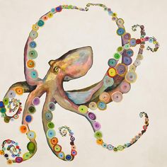 an octopus made out of buttons on a white background with the letter c in it's center