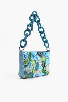 Front abstract embellished Shoulder Bag Beaded chain-linked Top Handle Top zip fastening Fully lined inside zip pocket Size: 9.75" x 5.5" x 1.5" Whether you're heading to a glamorous event or a night out on the town, the Blue Lagoon Glam Shoulder Bag is sure to turn heads and make a lasting impression. It is a statement piece that exudes elegance and sophistication. This shoulder bag is designed to elevate your ensemble with its captivating design and impeccable craftsmanship. At the forefront o Embellished Evening Bag For Summer, Embellished Evening Bags For Summer, Summer Evening Sequined Shoulder Bag, Hand Beaded Bag, Luxurious Aesthetic, The Blue Lagoon, Leopard Bag, Beaded Bag, Luxury Purses