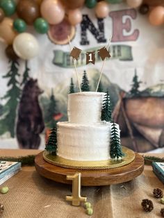 a white cake sitting on top of a wooden table