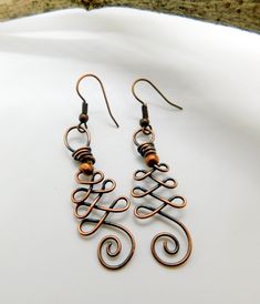 Unalome Copper Earrings, Handmade Wire Earrings, Spiritual Symbol, Hammered Jewelry, Boho Earrings, Woman's Long Dangle Earrings Gift Stunning Hand-Crafted Unique Statement Copper Wire earrings with a 4mm copper crimp bead all handmade with love.  Bohemian style, Unalome symbol earrings are made with 20-gauge bare copper wire oxidized for an antique look and a 4mm copper crimp bead. The wire is lightly hammered to give it strength and style of its own.  These gorgeous earrings will hang just und Copper Wrap Earrings As A Gift, Nickel Free Copper Chandelier Earrings As Gift, Nickel-free Copper Chandelier Earrings As Gift, Bronze Spiral Earrings For Gifts, Copper Wrap Earrings For Gift, Copper Wire Dangle Earrings As Gift, Spiral Copper Wire Earrings As Gift, Handmade Spiral Copper Wire Earrings, Unique Copper Wire Drop Earrings