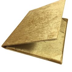 two pieces of gold cloth folded on top of each other