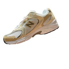 Brand New Hard To Find New Balance 530 Unisex Sneakers In Beige And Silver Men’s Size 8.5. Women’s 10 Original Box Included Sporty Gold Sneakers With Perforations, Gold Sneakers With Air Cushioning For Sports, Gold Low-top Running Sneakers, Gold Sporty Running Sneakers, Gold New Balance, Shoes Brand, New Balance Shoes, Silver Man, Hard To Find