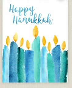 a happy hanukkah card with candles