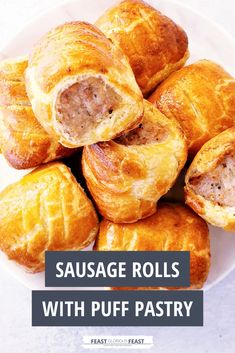 sausage rolls on a plate with puff pastry in the middle and text overlay reads sausage rolls with puff pastry