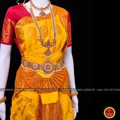 Design by Classical Dance Jewelry® ❥ Traditional Bharatanatyam costume wore during regular dance programs or arrangetram performance. ❥ Material : Art Silk ❥ Type : Traditional pant costume ❥ Easy to wear ❥ Layer front fan ❥❥❥❥ Dress Measurements in inches ( all the measurements approximately 1 margin buffer) ❥ PANT MEASUREMENTS: ☛ Pant Length: 38-40 inch ☛ Pant Waist: 35-37 inch ☛ Pant Hip: 38-39 ❥ BLOUSE MEASUREMENTS: ☛ Blouse length: 14 inch ☛ Blouse Shoulder length: 15 -16 inch ☛ Blouse arou Yellow Traditional Wear With Tilla For Navratri, Yellow Ceremonial Saree For Diwali, Yellow Traditional Wear With Tilla For Festive Occasions, Yellow Tilla Saree Traditional Wear, Bollywood Style Yellow Saree With Tilla, Gold Saree Set For Ceremonial Occasions, Yellow Bollywood Saree With Tilla Embroidery, Fitted Gold Traditional Wear With Tilla, Yellow Bollywood Saree With Tilla