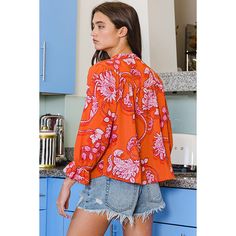 BucketList Orange and Red 100% Polyester Long Sleeve Crewneck 3/4 Sleeves Bell Sleeves Ruffled Details T2239-ORANGE Make a bold statement with the BucketList Women's Orange and Red Floral Crepe Blouse. Crafted from lightweight crepe fabric, this blouse offers both comfort and style for any occasion. The vibrant orange and red floral pattern adds a pop of color to your ensemble, instantly brightening your look. With its versatile design, this blouse can be dressed up with trousers for a polished Red Floral Pattern, Crepe Blouse, Vibrant Orange, Crepe Fabric, Red Floral, Bell Sleeves, Floral Pattern, Color Pop, Dress Up