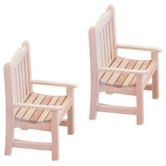 two wooden chairs sitting next to each other