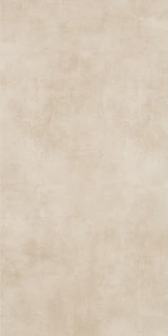 a large beige rug with no pattern on it