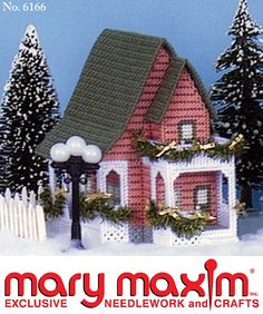 an advertisement for mary maxm's needlework and crafts featuring a house in the snow