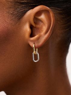 These gold drop earrings are a sign that you should start mixing your metals. Plated in 14k gold and cool-toned rhodium, these oval-shaped earrings are sure to keep the compliments coming. Whether you’re heading to work, brunch, or a dinner date, these earrings were designed to do it all. Bring your look together by adding our Brynley bracelet for the perfect finishing touch. • Crafted in 14k gold & rhodium • Mixed metal drop earrings • Removable second hoop for two looks in one Chunky Gold Earrings, Metal Drop, Mixed Metal Earrings, Minimal Earrings, Mixed Metal Jewelry, Bold Earrings, Gold Filled Earrings, Timeless Jewelry, Gold Drop Earrings