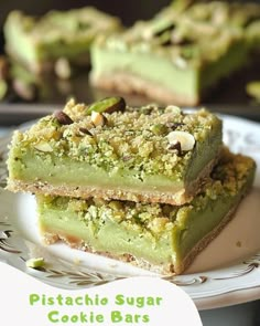 two pieces of pistachio sugar cookie bars on a plate