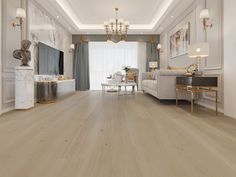 an elegant living room with wood floors and white walls, along with chandeliers