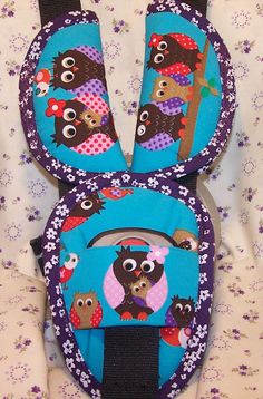 two children's backpacks with owls on them