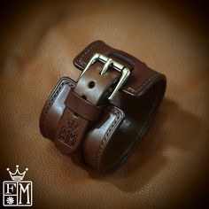 "This brown leather cuff uses vegetable tanned, anerican bridle leather. It is saddlestitched by hand and edges are burnished and waxed smooth! It has a 3/4\" strap woven through the center. A beautiful roller buckle closes it up. I'll need your wrist size for this cuff! Please use the instructions in the last pic above! - 2\" wide - Luxury construction - Beautiful bridle leather Thanks for checking out my work! I use a fine hand in my work bridging the gap between craft and art and truly love m Jason Williams, Leather Wristband, Leather Wristbands, Cuff Watch, Leather Cuffs Bracelet, Leather Cuffs, The Gap, High Quality Leather, Leather Working