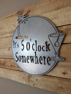 there is a sign that says it's 5 o clock somewhere on the wall