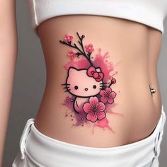 a hello kitty tattoo on the side of a woman's stomach with pink flowers