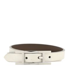 This is an authentic HERMES Swift Behapi Double Tour Bracelet size T2 in Etoupe and Nata. This stylish bracelet is crafted of swift calfskin leather in taupe on one side and light beige on the other. The bracelet wraps around the wrist three times and closes with a gold Hermes H buckle. Hermes Bracelet, Hermes Jewelry, Stylish Bracelet, Bracelet Sizes, Light Beige, Calf Skin, Swift, Buckle, Bracelet