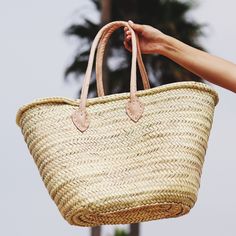 "This bag is handwoven in the souks of Morocco, from a palm leaf. It is a \"Slow Fashion\" product representing everything that is eco, ethical and green. Even though this Spring & Summer season is all about straw. Small round wicker French basket, hand woven in Marrakesh by friends and family. Ideal small shopper or beach bag. Also a perfect bag or gift for a girl - great for school books etc. This braided bag is perfect anytime and everywhere, Especially in the summer and there are those w Market Basket Bag, French Market Bag, Moroccan Basket, French Market Basket, Braided Bag, French Baskets, Market Basket, Hippy Chic, Straw Basket