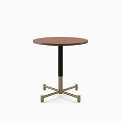 an image of a table with wheels on the legs and a round wooden table top