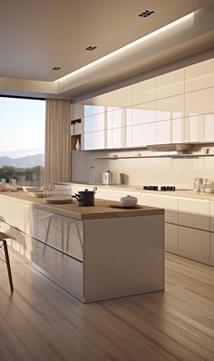 a modern kitchen with white cabinets and wood flooring is seen from across the room